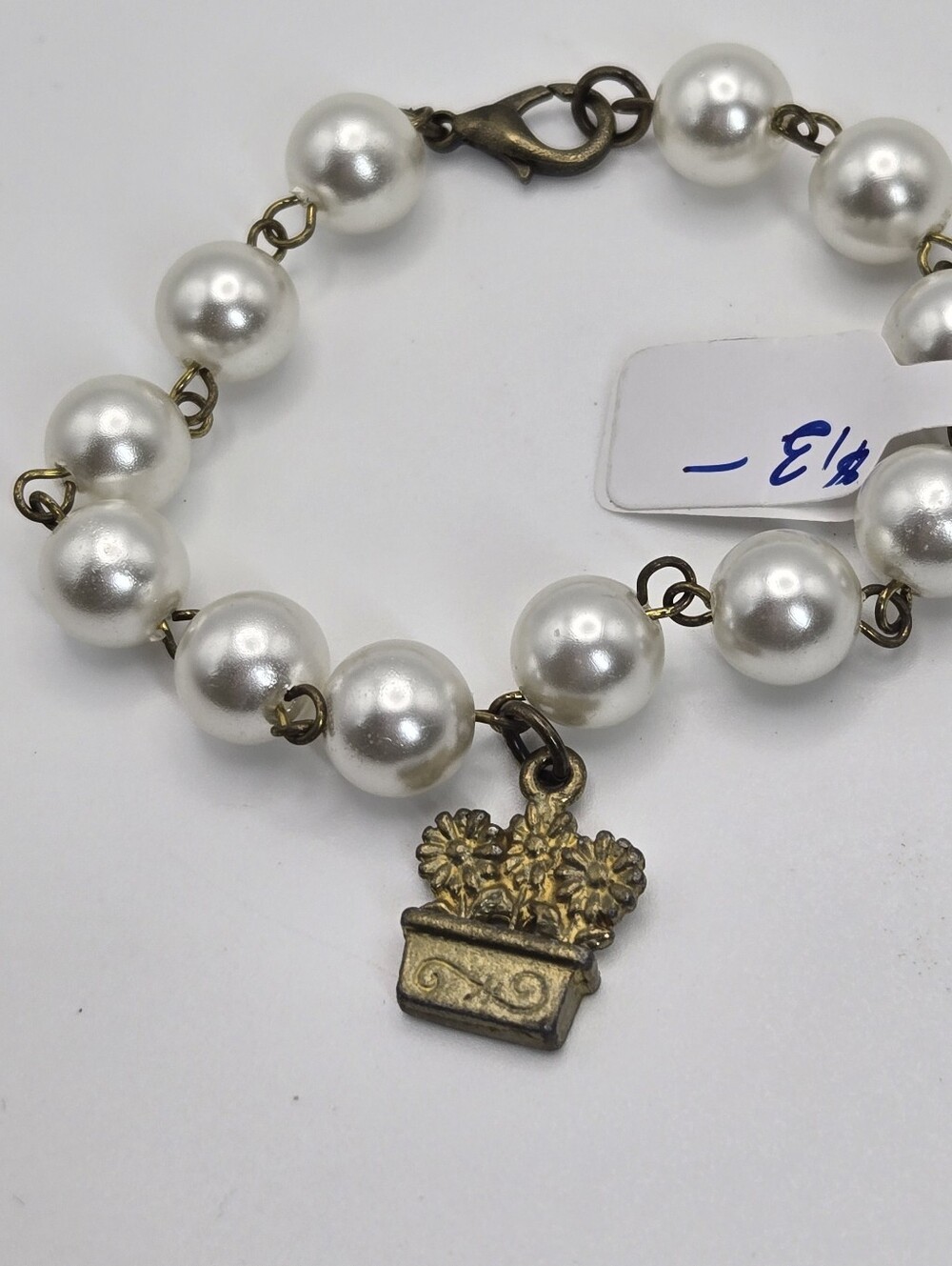 Basket Of Flowers Faux Pearl Bracelet With Bronze Finnish